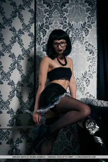 Brunette in Stockings and Glasses Inserts Candles in Her Pussy and Asshole