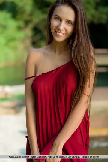 European Brunette Strips Out of Her Skirt by the Dam