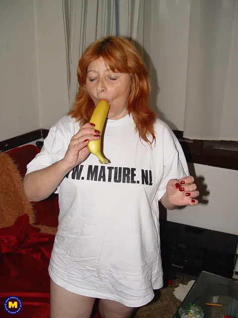 Thick Mature Redhead Masturbates with a Banana and Pisses – photo 10 of 21