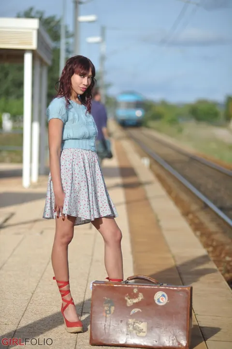Distania: Tall Asian Brunette Strips Out of Her Skirt Outdoors – photo 1 of 12