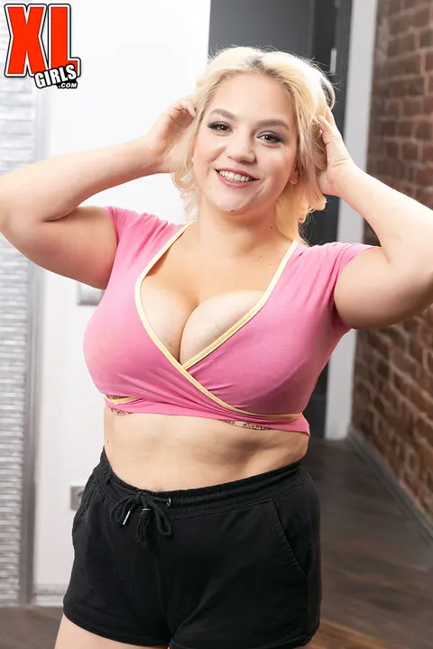 Blonde BBW Shows Her Big Tits in Panties and Shorts on the Bed – photo 4 of 16