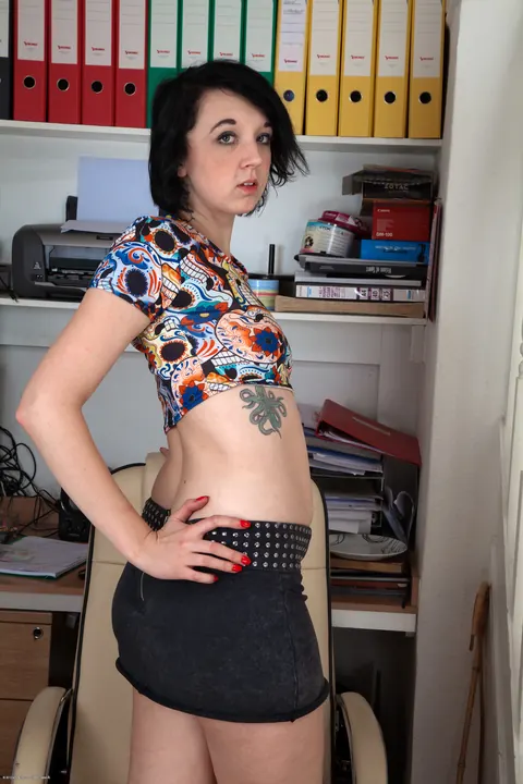 Short-Haired Woman Strips Off Her Uniform and Spreads Her Hairy Pussy – photo 3 of 21
