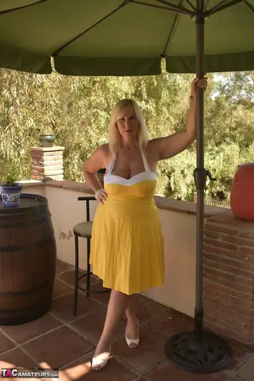 BBW Blonde Peels Off Her Dress on the Balcony
