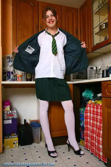British Redhead Strips Out of Her Uniform and Fingers Herself in the Kitchen