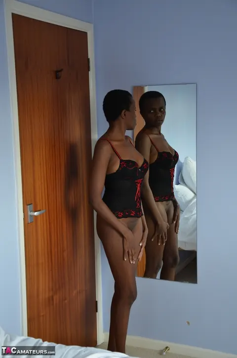 Ebony Woman in Lingerie Spreads in the Bathroom – photo 2 of 16