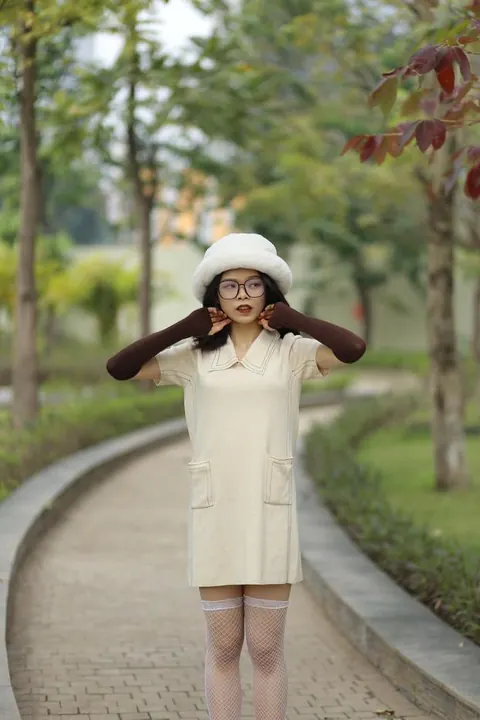 Petite Asian Woman in Glasses Undresses Outdoors – photo 7 of 21