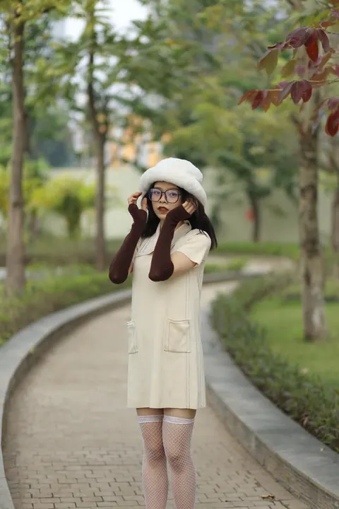 Petite Asian Woman in Glasses Undresses Outdoors – photo 6 of 21