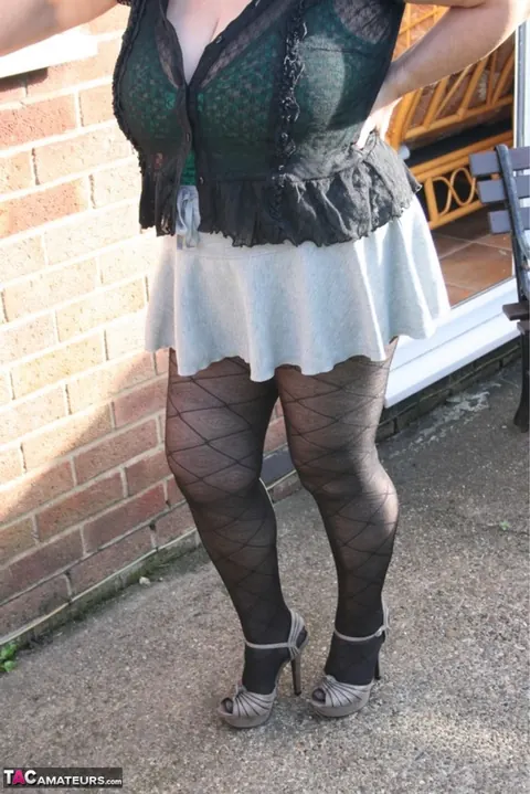 Kinky Carol: Mature Curvy Brunette Poses in Lingerie and Pantyhose Outdoors – photo 3 of 16