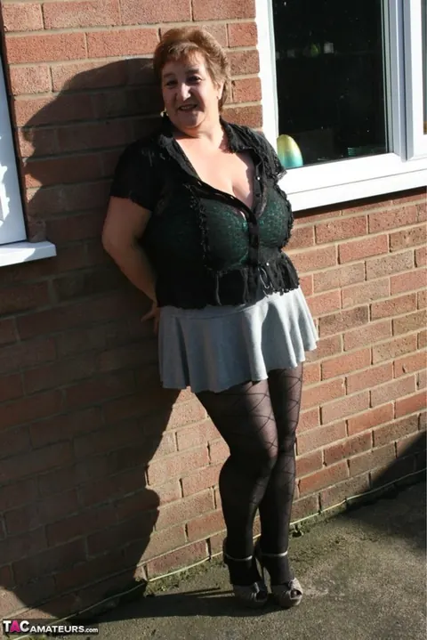 Kinky Carol: Mature Curvy Brunette Poses in Lingerie and Pantyhose Outdoors – photo 7 of 16
