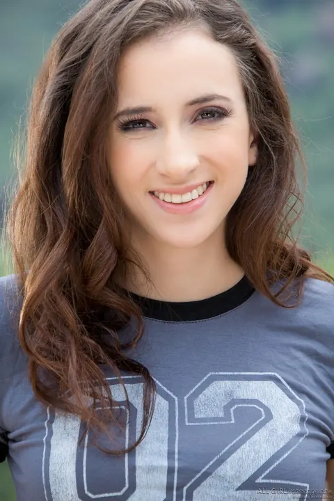 Belle Knox: Slim Brunette Strips Out of Her Shorts and Panties by the Pool – photo 1 of 15