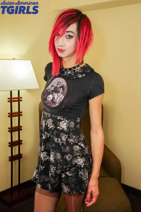 Slim Trans Woman Pulls Top Down and Strips Nude to Show Her Body – photo 1 of 16
