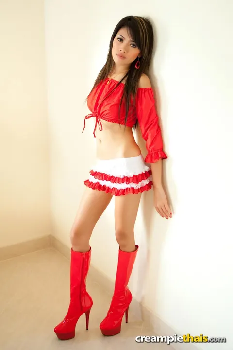 Skinny Thai Brunette Poses in Uniform and Heels – photo 1 of 16