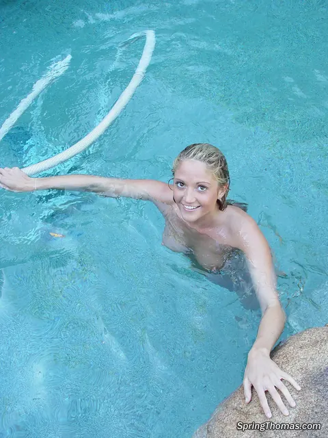 Spring Thomas: Tall Blonde Strips Out of Her Bikini and Masturbates by the Pool on Easter – photo 16 of 20
