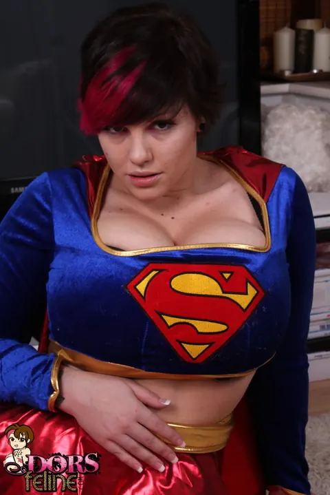 Dors Feline: Thick Brunette MILF Strips Off Her Hero Costume to Show Her Big Natural Tits – photo 3 of 16