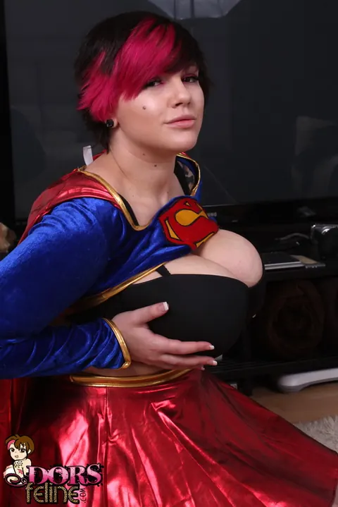 Dors Feline: Thick Brunette MILF Strips Off Her Hero Costume to Show Her Big Natural Tits – photo 6 of 16