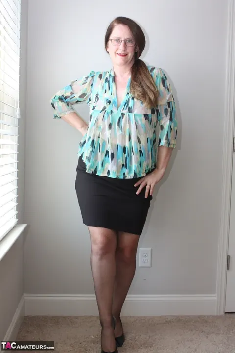 Mature Chubby Woman Uncovers Her Boobs in Sheer Hose and a Skirt – photo 2 of 20