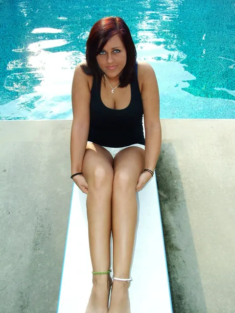 Redhead Goes Topless and Poses by the Pool – photo 8 of 21