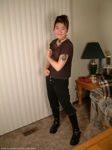Asian Woman in Stockings Removes Her Boots and Spreads Her Hairy Pussy
