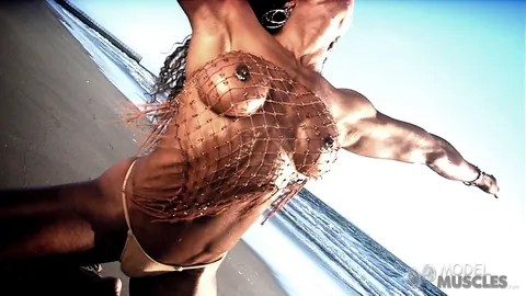 Alexis Ellis: Busty Ebony Bodybuilder Strips Out of Her Panties on the Beach – photo 18 of 21