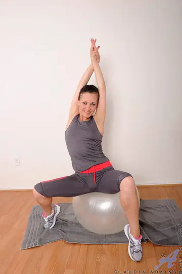 Mature European Brunette Strips After a Workout to Finger Her Pussy in the Gym