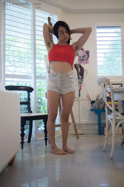 Short-Haired Amateur Flashes Hairy Armpits and Ass While Undressing – photo 17 of 18