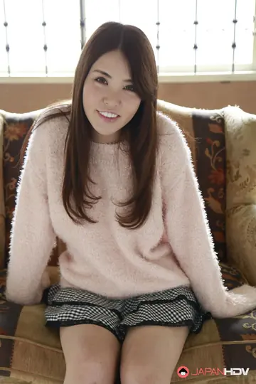 Busty Japanese Brunette Strips Out of Her Skirt and Panties to Stand Nude