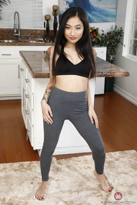Avery Black: Petite Asian Brunette Pulls Yoga Pants Aside to Finger Her Pussy – photo 1 of 20