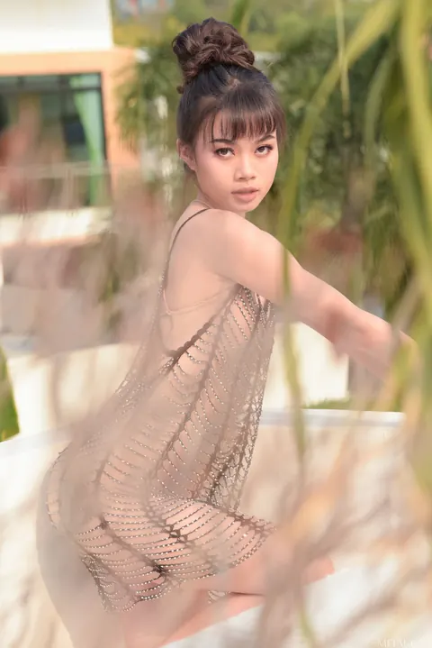 Petite Thai Woman Undresses Outdoors – photo 1 of 20