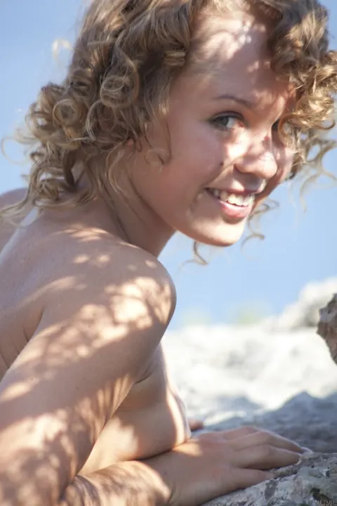 Curly Woman Undresses and Spreads Her Legs Outdoors – photo 16 of 21