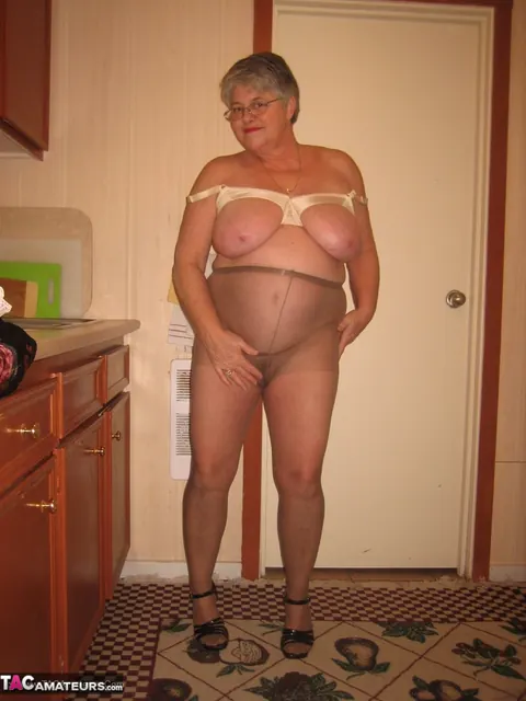 Curvy Short-Haired MILF Strips Off Her Lingerie in the Kitchen – photo 18 of 20