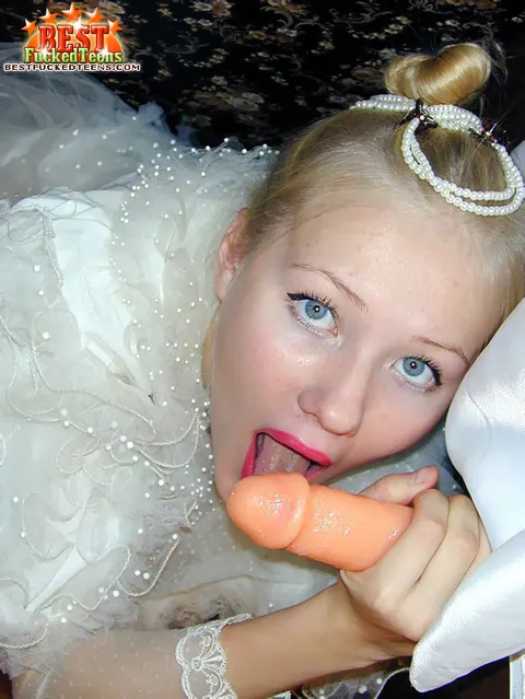 Blonde in Wedding Dress and Stockings Uses a Dildo – photo 18 of 18