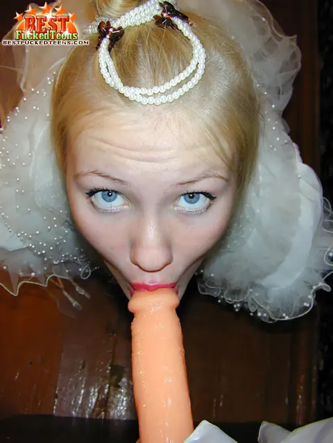 Blonde in Wedding Dress and Stockings Uses a Dildo – photo 17 of 18