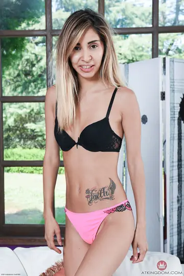 Petite Latina Undresses to Show Tattoo and Small Tits