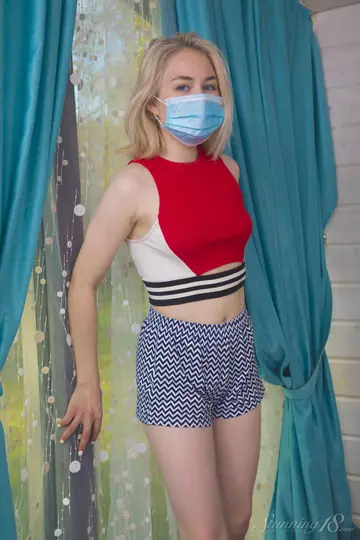Blonde Strips Out of Her Shorts and Panties to Finger Her Pussy