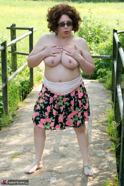 Mature BBW Poses as Topless Doctor in the Forest – photo 10 of 16