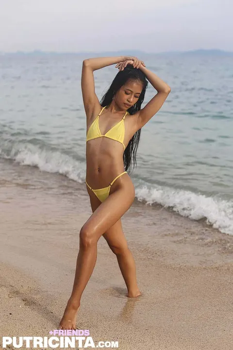 Petite Asian Brunette Oils Up in a Yellow Bikini Outdoors – photo 6 of 21