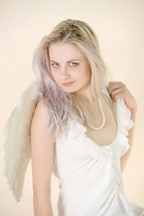 Pale Blonde Spreads in Stockings and Skirt – photo 2 of 16