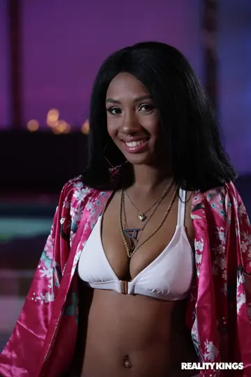Busty Ebony Brunette in a Bikini Spreads for Hardcore Sex