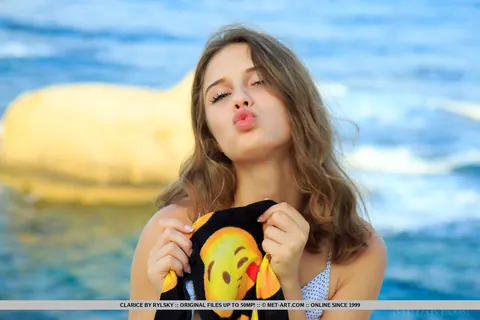 Russian Woman Shows Her Shaved Pussy on the Beach – photo 2 of 18