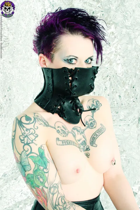 Nixon Sixx: Short-Haired Brunette Flaunts Her Tattoos in a Leather Corset and Lingerie – photo 8 of 15