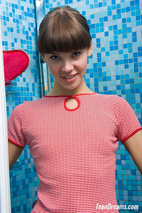 Petite Slim Woman Poses Nude Outdoors and in the Bathroom – photo 1 of 21