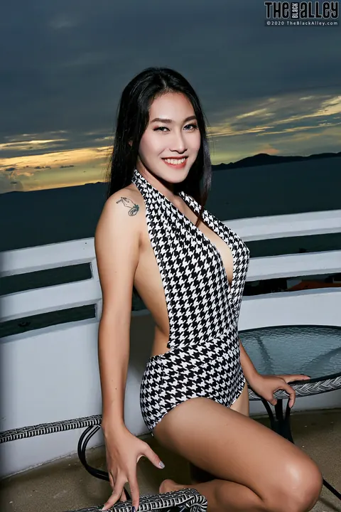 Linlin: Asian Blonde with Big Tits Bares All on a Seaside Balcony – photo 2 of 16