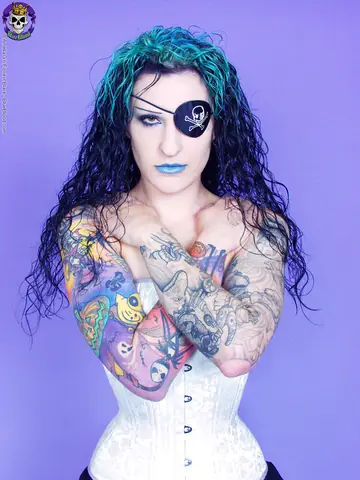 Jen Vixen – Tattooed Brunette in Cosplay Boots and Skirt Shows Her Shaved Pussy