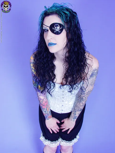 Jen Vixen: Tattooed Brunette in Cosplay Boots and Skirt Shows Her Shaved Pussy – photo 6 of 15