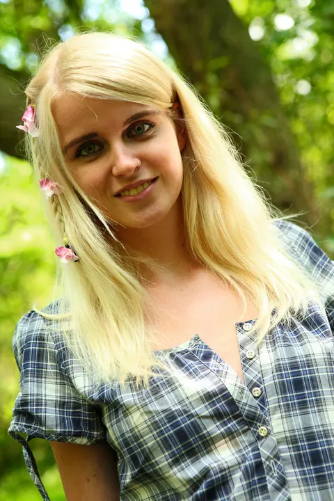 Blonde Fingers Her Shaved Pussy on a Tree Limb Outdoors – photo 4 of 10