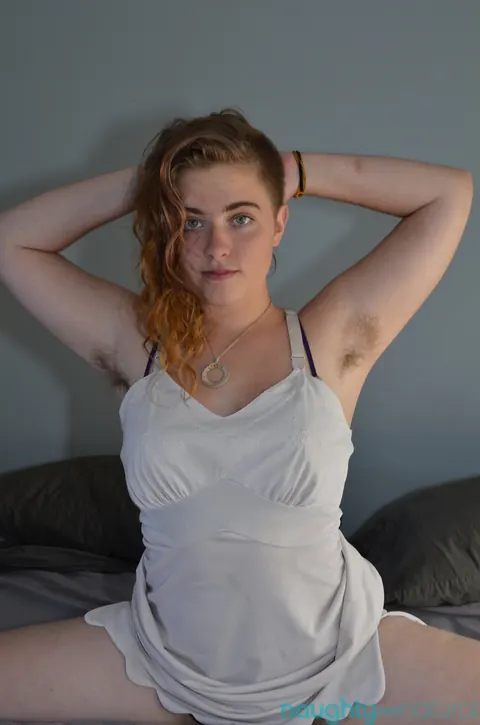Curly Blonde Undresses and Spreads Her Hairy Pussy – photo 9 of 20