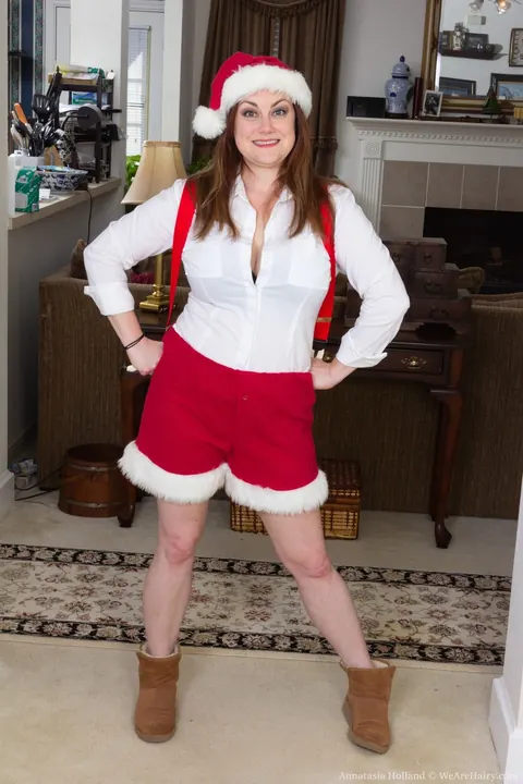 Annatasia Holland: Redhead BBW Strips Off Her Christmas Costume and Spreads Hairy Crotch – photo 3 of 21
