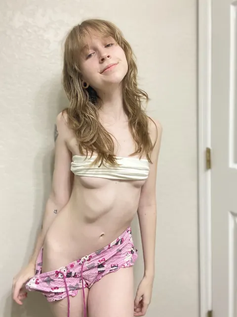 Slim Woman Spreads Her Legs Wearing Only Shorts – photo 3 of 16