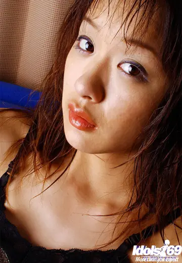Japanese Babe Strips Off Her Panties to Show Her Hairy Pussy