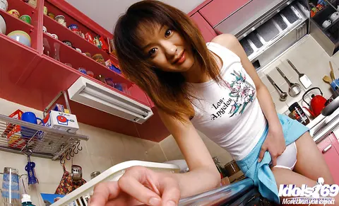 Japanese Babe Strips Off Her Panties to Show Her Hairy Pussy – photo 9 of 16